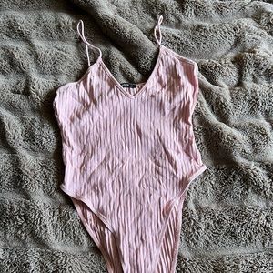 Pink body suit